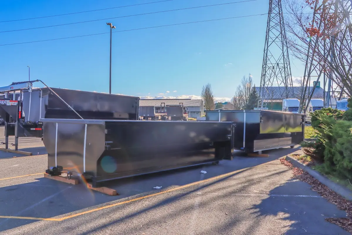 Roll-off dumpster ready for waste disposal at job site for Construction Dumpster Rental in Eldridge
